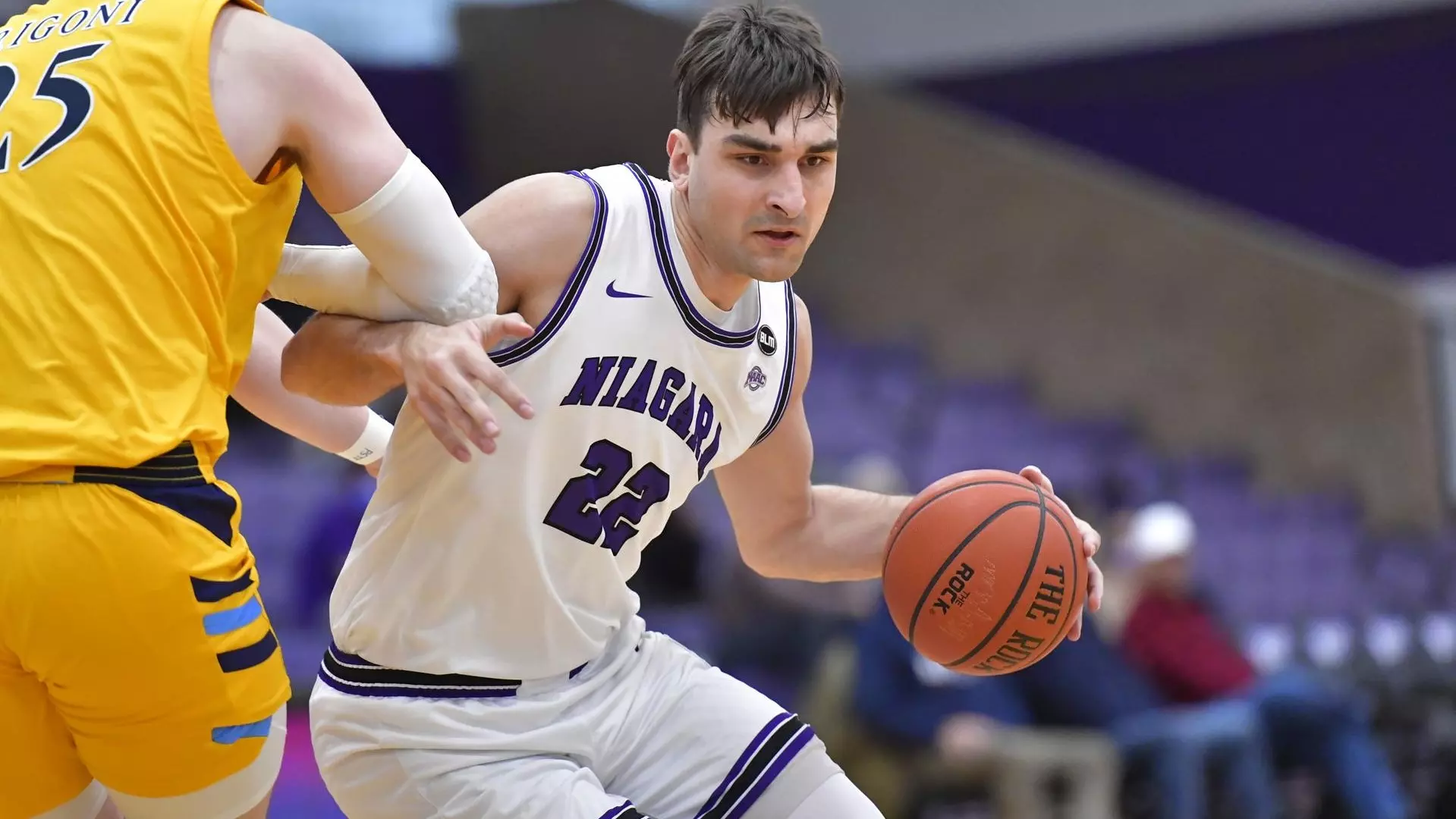 Sam Iorio drives past a defender in a SCBL youth basketball game, wearing a Nittany jersey during competitive play across the Lehigh Valley tonight.